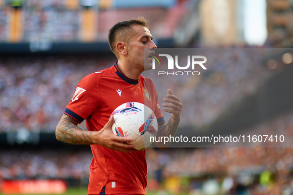 Ruben Pena of CA Osasuna holds the ball during the LaLiga EA Sports match between Valencia CF and CA Osasuna at Mestalla stadium in Valencia...