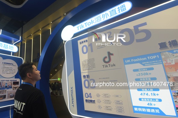 Visitors look at the TikTok booth at the Global Digital Trade Expo in Hangzhou, China, on September 25, 2024. 