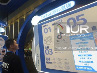 Visitors look at the TikTok booth at the Global Digital Trade Expo in Hangzhou, China, on September 25, 2024. (