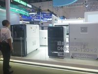 Viewers watch BGI Genomics' ultra-high throughput sequencer at the Global Digital Trade Expo in Hangzhou, China, on September 25, 2024. (