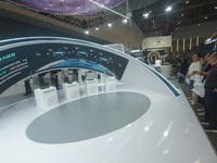 The audience visits the subsystem of the Liangzhu satellite constellation with a space-based AI model at the Global Digital Trade Expo in Ha...