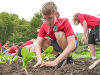 Middle school students from the United Kingdom grow vegetables in Houwu village, Moganshan town, Deqing County, Huzhou city, East China's Zh...