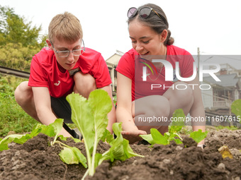 Middle school students from the United Kingdom grow vegetables in Houwu village, Moganshan town, Deqing County, Huzhou city, East China's Zh...