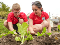 Middle school students from the United Kingdom grow vegetables in Houwu village, Moganshan town, Deqing County, Huzhou city, East China's Zh...