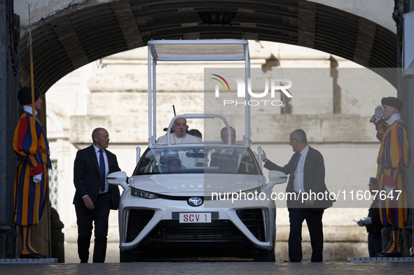 Pope Francis arrives to lead Wednesday's general audience in Saint Peter's Square, Vatican City, on September 25, 2024 