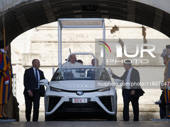 Pope Francis arrives to lead Wednesday's general audience in Saint Peter's Square, Vatican City, on September 25, 2024 (