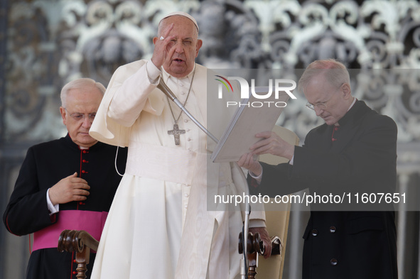 Pope Francis blesses the crowd at the end of his Wednesday general audience in Saint Peter's Square, Vatican City, on September 25, 2024 