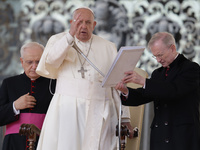 Pope Francis blesses the crowd at the end of his Wednesday general audience in Saint Peter's Square, Vatican City, on September 25, 2024 (