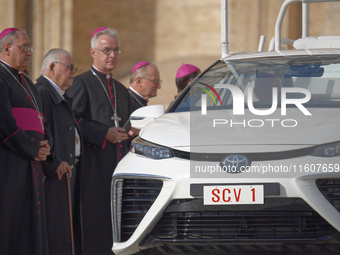 The Toyota Mirai hydrogen-powered popemobile leaves St. Peter's Square at the end of the weekly general audience in The Vatican, on Septembe...