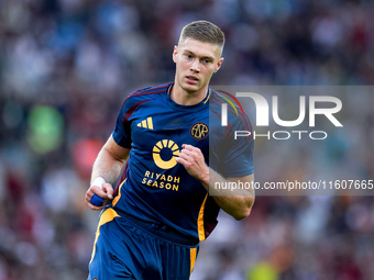 Artem Dovbyk of AS Roma celebrates after scoring first goal during the Serie A Enilive match between AS Roma and Udinese Calcio at Stadio Ol...