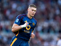 Artem Dovbyk of AS Roma celebrates after scoring first goal during the Serie A Enilive match between AS Roma and Udinese Calcio at Stadio Ol...