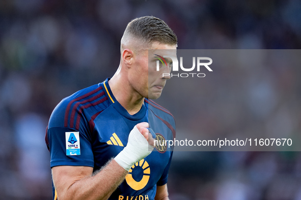 Artem Dovbyk of AS Roma celebrates after scoring first goal during the Serie A Enilive match between AS Roma and Udinese Calcio at Stadio Ol...