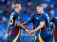 Artem Dovbyk of AS Roma celebrates after scoring first goal during the Serie A Enilive match between AS Roma and Udinese Calcio at Stadio Ol...