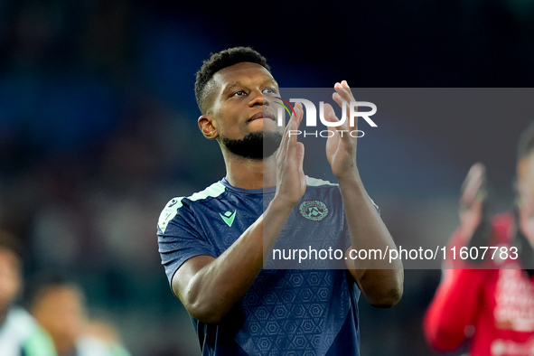 Christian Kabasele of Udinese Calcio applauds during the Serie A Enilive match between AS Roma and Udinese Calcio at Stadio Olimpico on Sept...