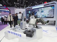 Visitors visit the ''Low-altitude Flight Service Regulatory Platform System'' at the booth of China Telecom at the 2024 China International...