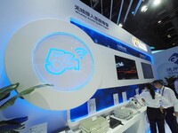 Visitors visit the ''5G Wireless Access System'' at the 2024 China International Information and Communication Exhibition in Beijing, China,...