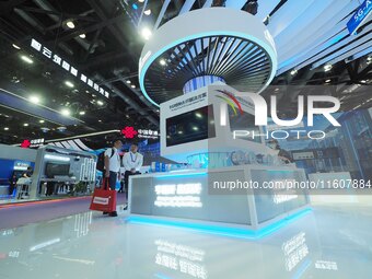 Visitors visit the ''5G Special Fiber'' at the 2024 China International Information and Communication Exhibition in Beijing, China, on Septe...