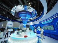 Visitors view ''5G network equipment'' at the China International Information and Communication Exhibition 2024 in Beijing, China, on Septem...