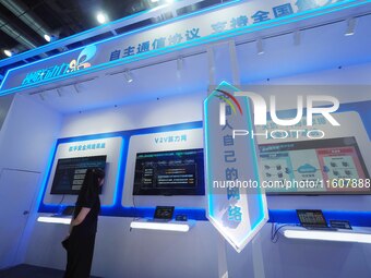 Visitors visit the ''Network Security Protection System'' at the 2024 China International Information and Communication Exhibition in Beijin...