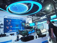 Visitors visit the ''Emergency Command System'' at the 2024 China International Information and Communication Exhibition in Beijing, China,...