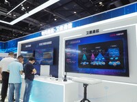 Visitors visit the ''Satellite Communication System'' at the booth of China Electronics at the 2024 China International Information and Comm...