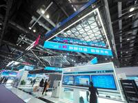 Visitors visit the booth of China Tower at the 2024 China International Information and Communication Exhibition in Beijing, China, on Septe...