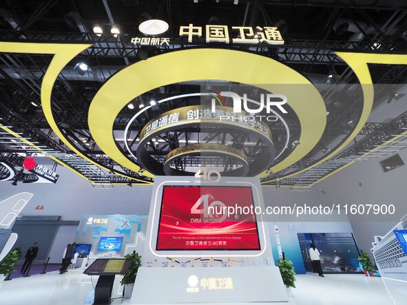 Visitors visit the booth of China Satcom at the 2024 China International Information and Communications Exhibition in Beijing, China, on Sep...