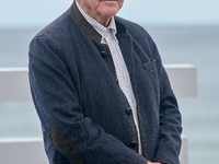 Costa-Gavras attends the photocall of ''Le Dernier Souffle'' during the 72nd San Sebastian International Film Festival in San Sebastian, Spa...