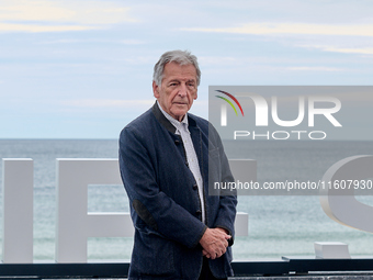 Costa-Gavras attends the photocall of ''Le Dernier Souffle'' during the 72nd San Sebastian International Film Festival in San Sebastian, Spa...