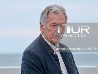 Costa-Gavras attends the photocall of ''Le Dernier Souffle'' during the 72nd San Sebastian International Film Festival in San Sebastian, Spa...