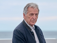 Costa-Gavras attends the photocall of ''Le Dernier Souffle'' during the 72nd San Sebastian International Film Festival in San Sebastian, Spa...