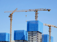 Tower cranes are seen at a real estate construction site in Beijing, China, on September 12, 2024. On September 24, 2024, the press conferen...