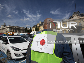 Driving instructors protest in Sofia, Bulgaria, on September 25, 2024, against new driver training regulations concerning the digitization o...