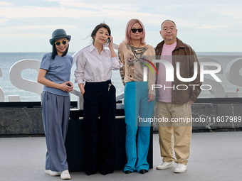 Xin You, Ni Ni, You Zhou, and Fan Liao attend the photocall of ''Bound in Heaven'' during the 72nd San Sebastian International Film Festival...