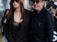 Monica Bellucci and Tim Burton arrive at the Maria Cristina Hotel during the 72nd San Sebastian International Film Festival in San Sebastian...