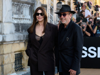 Monica Bellucci and Tim Burton arrive at the Maria Cristina Hotel during the 72nd San Sebastian International Film Festival in San Sebastian...