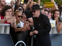 Monica Bellucci and Tim Burton arrive at the Maria Cristina Hotel during the 72nd San Sebastian International Film Festival in San Sebastian...