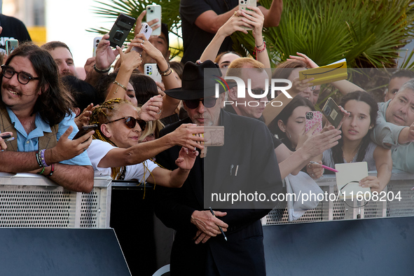 Monica Bellucci and Tim Burton arrive at the Maria Cristina Hotel during the 72nd San Sebastian International Film Festival in San Sebastian...