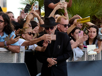 Monica Bellucci and Tim Burton arrive at the Maria Cristina Hotel during the 72nd San Sebastian International Film Festival in San Sebastian...