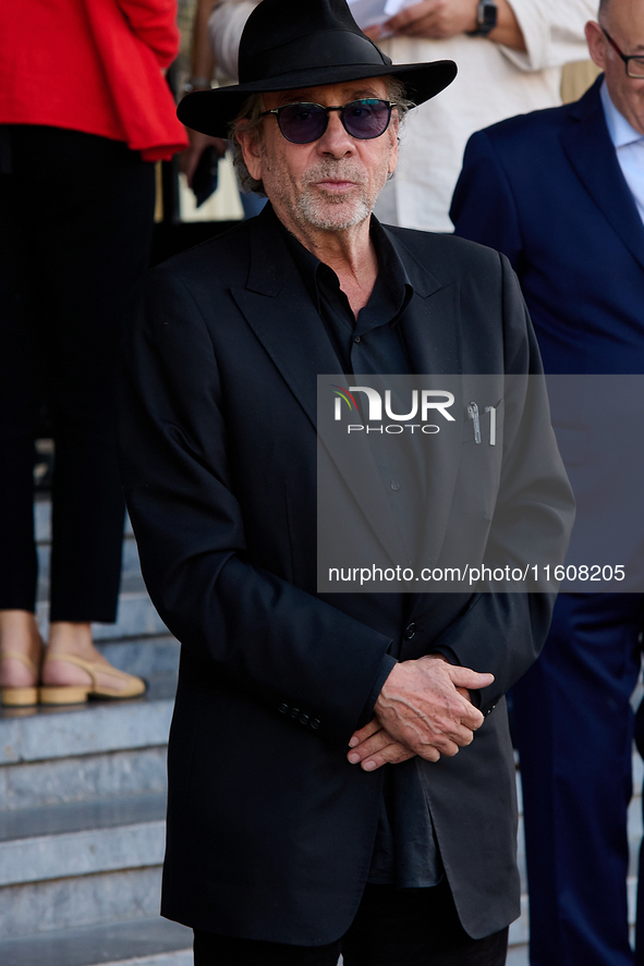 Monica Bellucci and Tim Burton arrive at the Maria Cristina Hotel during the 72nd San Sebastian International Film Festival in San Sebastian...