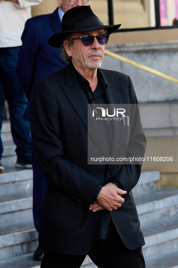 Monica Bellucci and Tim Burton arrive at the Maria Cristina Hotel during the 72nd San Sebastian International Film Festival in San Sebastian...