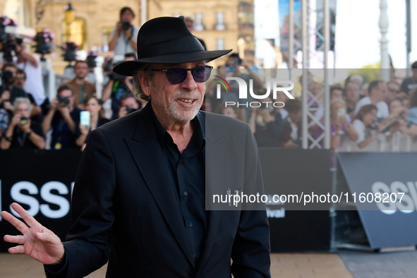 Monica Bellucci and Tim Burton arrive at the Maria Cristina Hotel during the 72nd San Sebastian International Film Festival in San Sebastian...