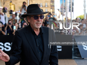 Monica Bellucci and Tim Burton arrive at the Maria Cristina Hotel during the 72nd San Sebastian International Film Festival in San Sebastian...