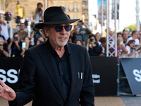 Monica Bellucci and Tim Burton arrive at the Maria Cristina Hotel during the 72nd San Sebastian International Film Festival in San Sebastian...