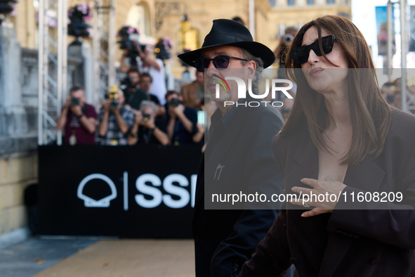 Monica Bellucci and Tim Burton arrive at the Maria Cristina Hotel during the 72nd San Sebastian International Film Festival in San Sebastian...