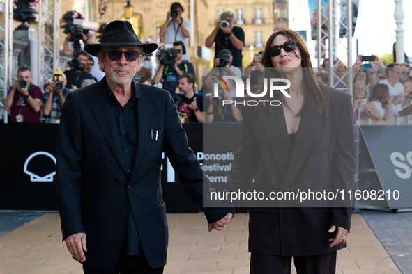 Monica Bellucci and Tim Burton arrive at the Maria Cristina Hotel during the 72nd San Sebastian International Film Festival in San Sebastian...