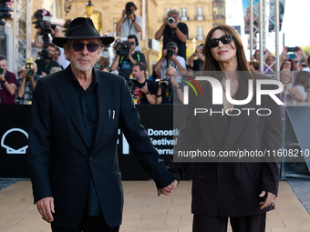 Monica Bellucci and Tim Burton arrive at the Maria Cristina Hotel during the 72nd San Sebastian International Film Festival in San Sebastian...