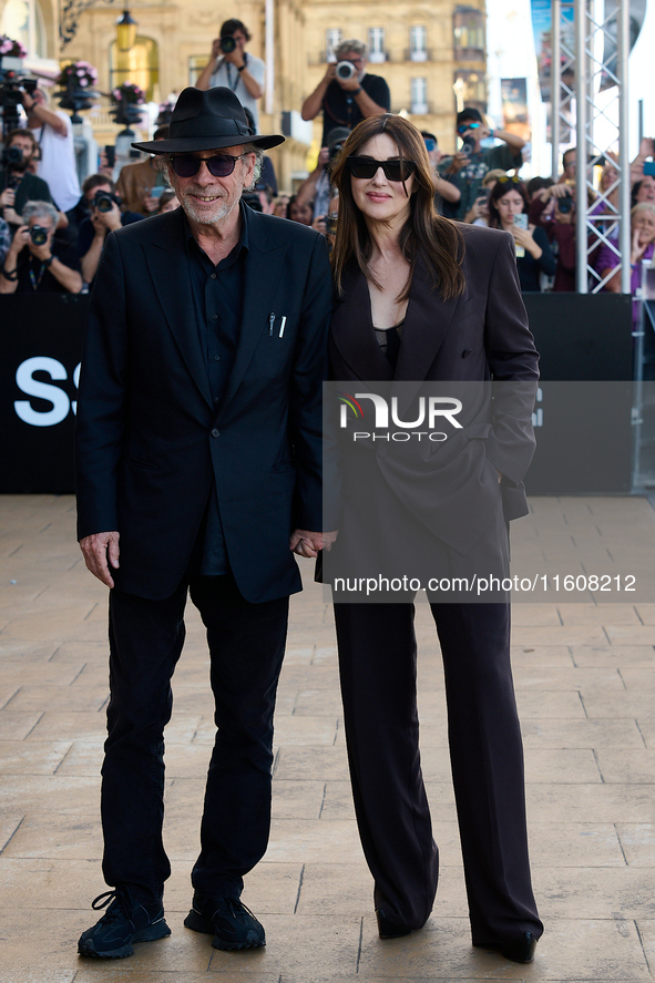 Monica Bellucci and Tim Burton arrive at the Maria Cristina Hotel during the 72nd San Sebastian International Film Festival in San Sebastian...