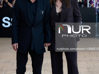 Monica Bellucci and Tim Burton arrive at the Maria Cristina Hotel during the 72nd San Sebastian International Film Festival in San Sebastian...