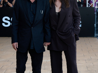 Monica Bellucci and Tim Burton arrive at the Maria Cristina Hotel during the 72nd San Sebastian International Film Festival in San Sebastian...